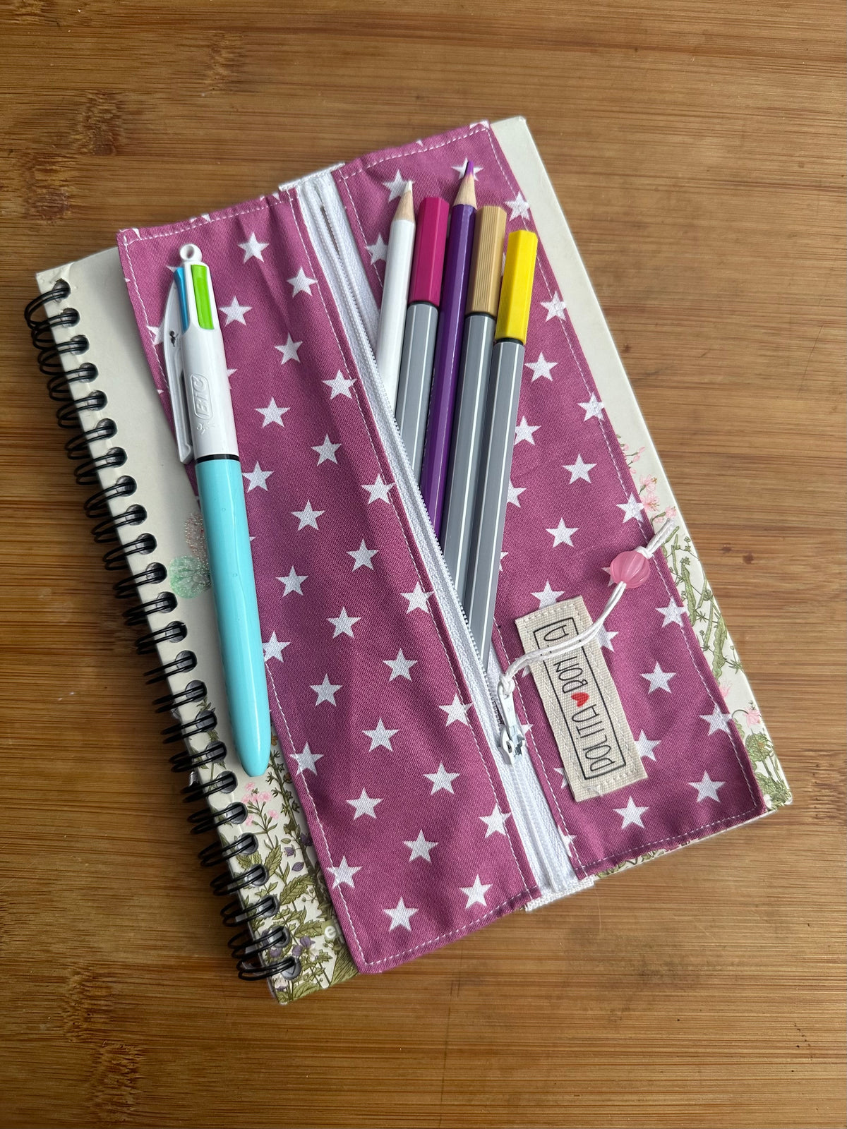 Estuche para libreta “estrellas fucsia”|polita bonita
